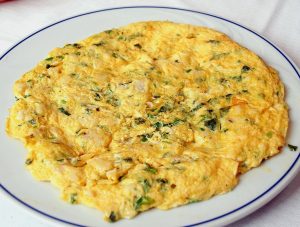 Omelette romántico con hierbas